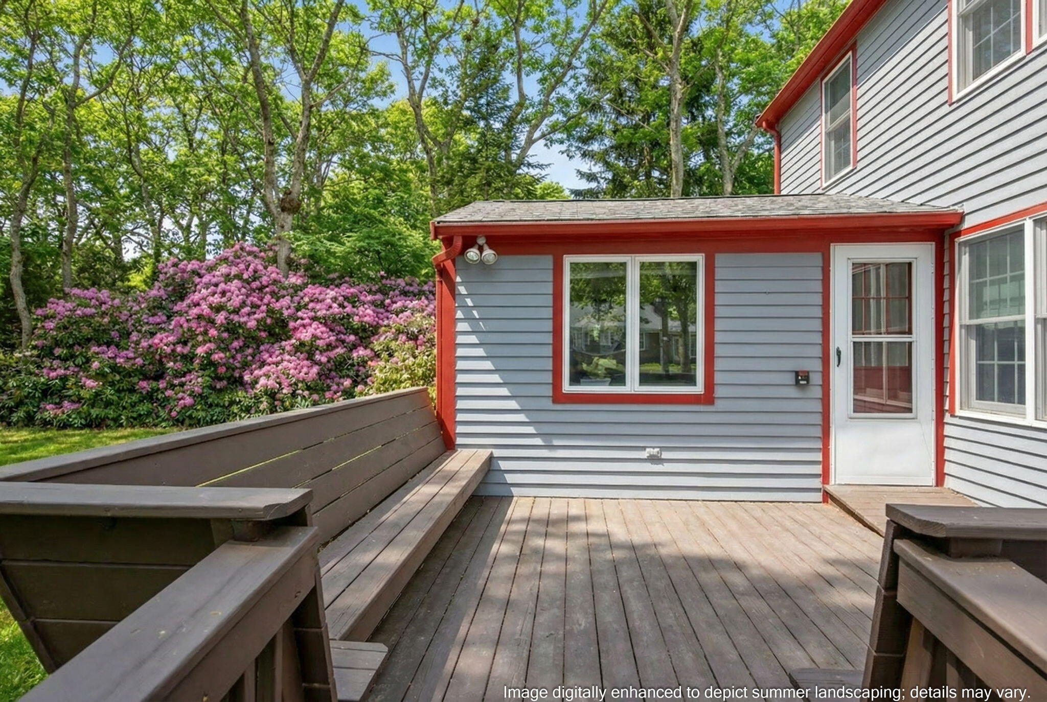 56 Raymond Street Falmouth, MA 02540 - Photo 2 of 45 a view of a two chairs in the balcony