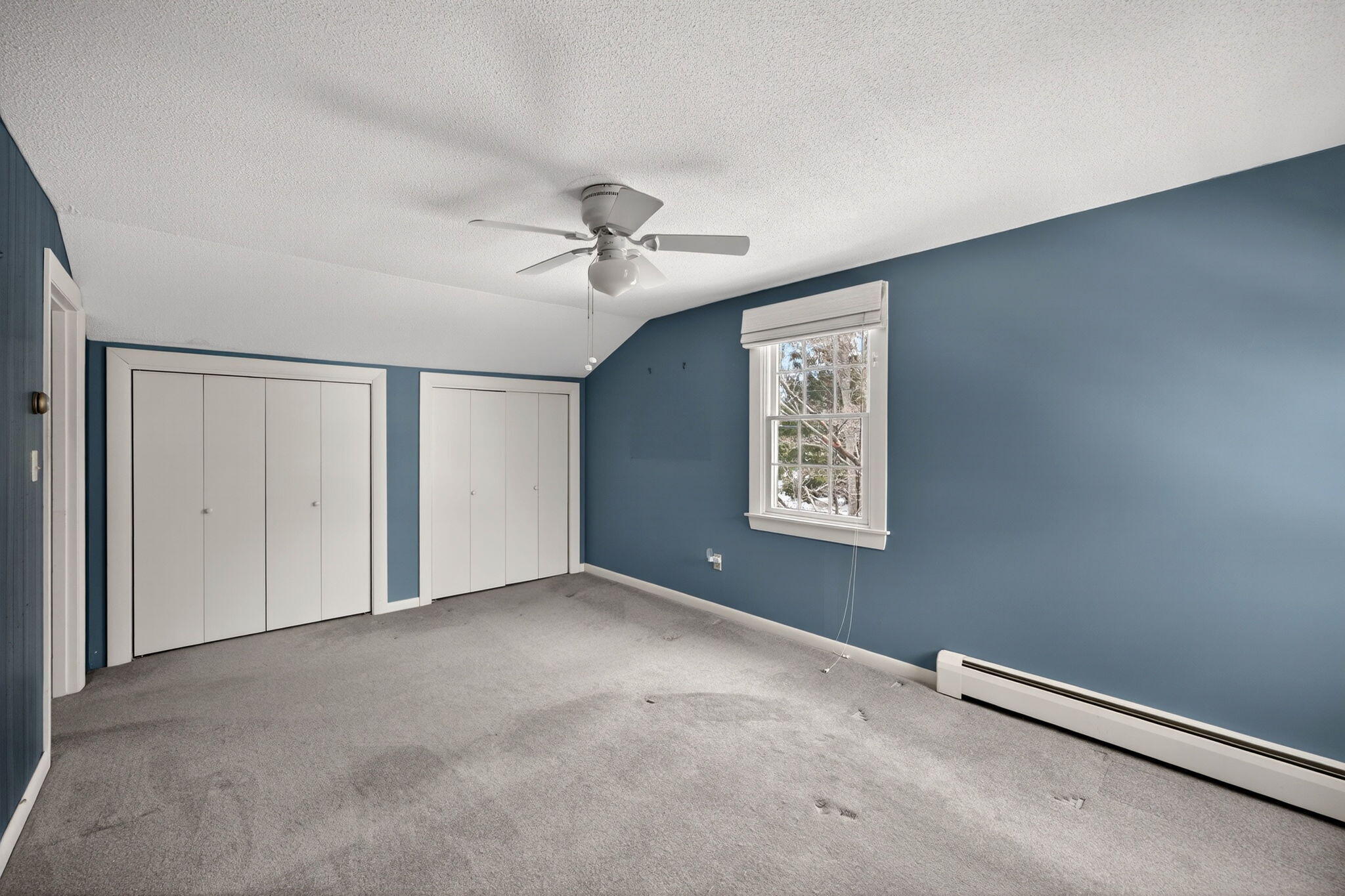 56 Raymond Street Falmouth, MA 02540 - Photo 29 of 45 a view of an empty room with a ceiling fan