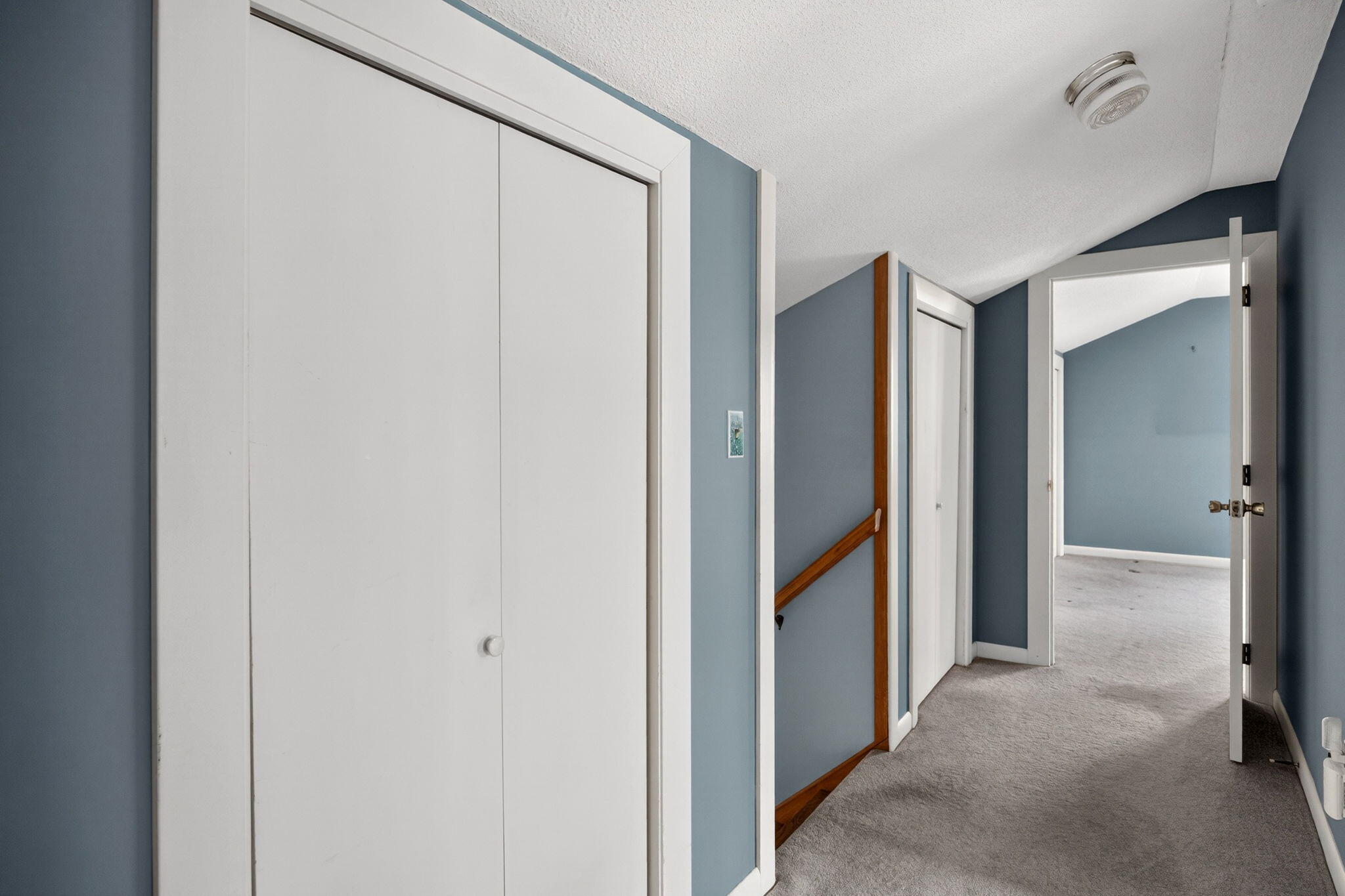 56 Raymond Street Falmouth, MA 02540 - Photo 35 of 45 a view of a hallway with a hallway