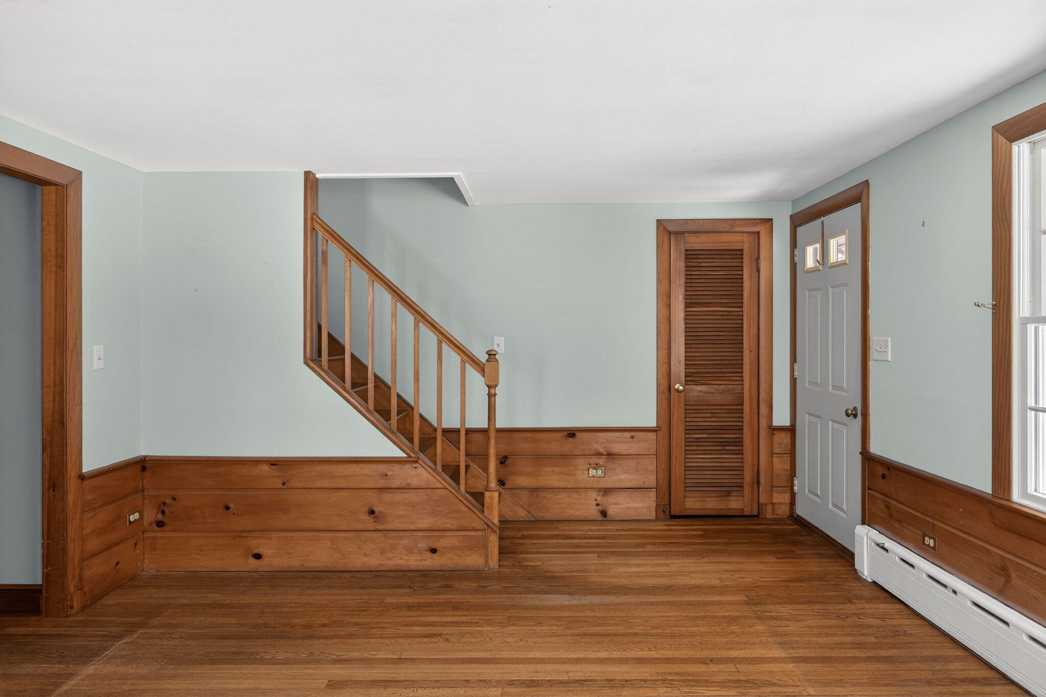 56 Raymond Street Falmouth, MA 02540 - Photo 10 of 45 a view of entryway with wooden floor
