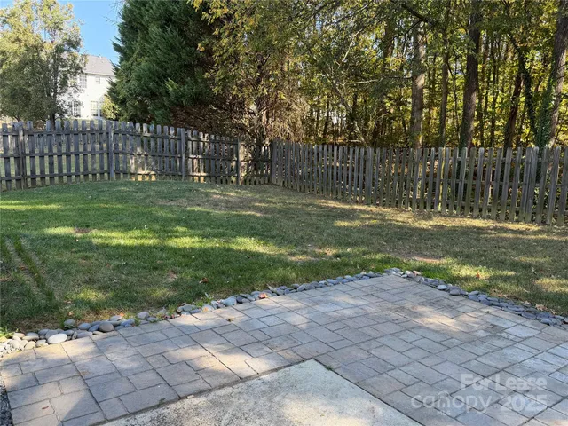 a view of a park with large trees