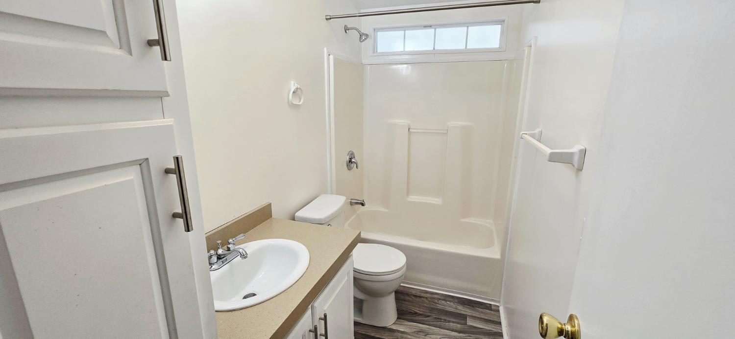 226 Full Circle Davis, CA 95618 - Photo 16 of 27 a bathroom with a sink toilet and shower