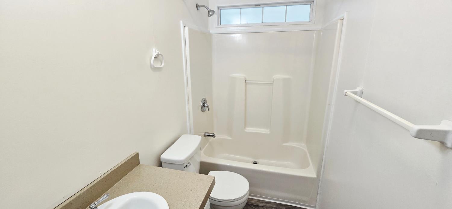 226 Full Circle Davis, CA 95618 - Photo 17 of 27 a bathroom with a toilet and a shower
