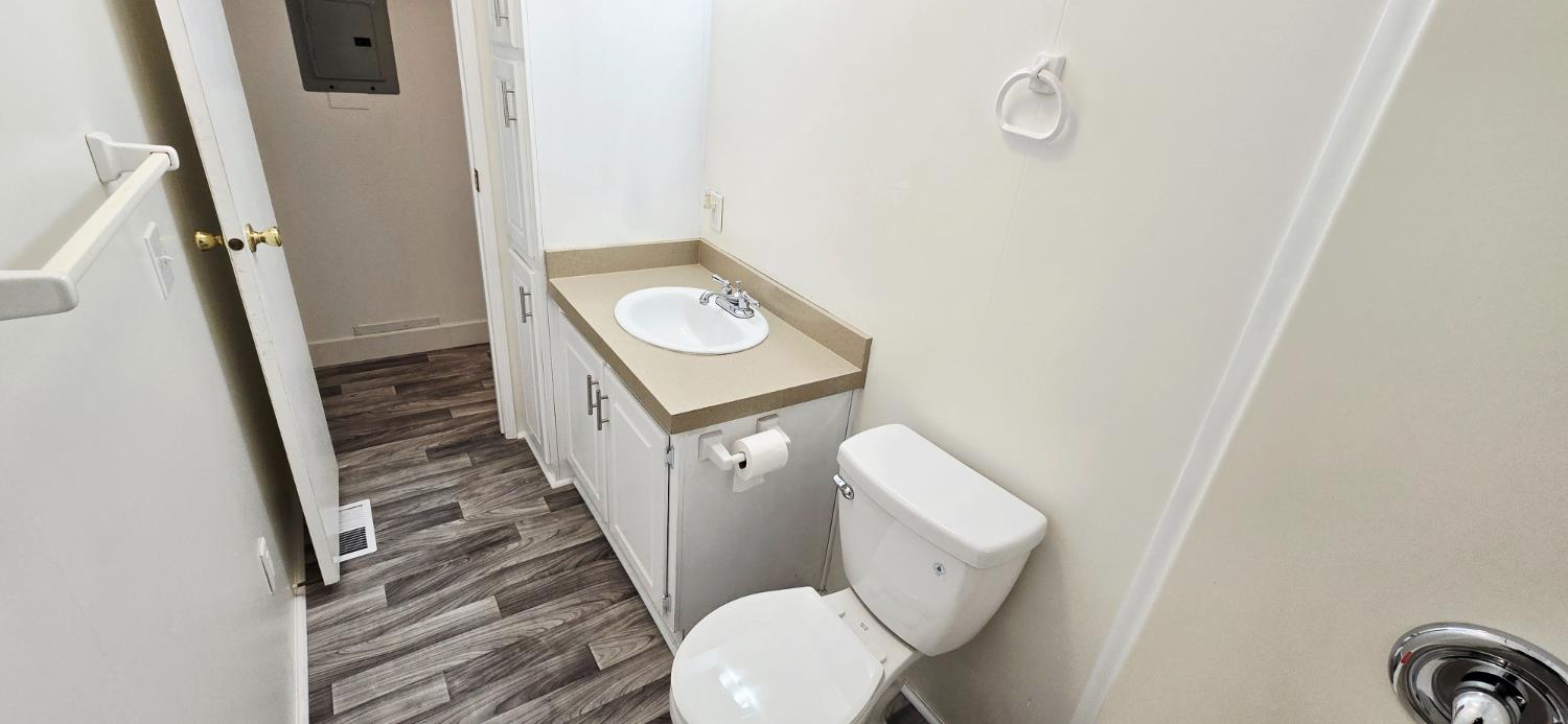 226 Full Circle Davis, CA 95618 - Photo 18 of 27 a bathroom with a toilet and a sink