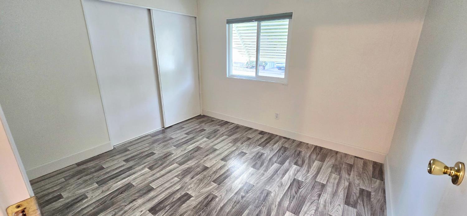226 Full Circle Davis, CA 95618 - Photo 19 of 27 an empty room with windows