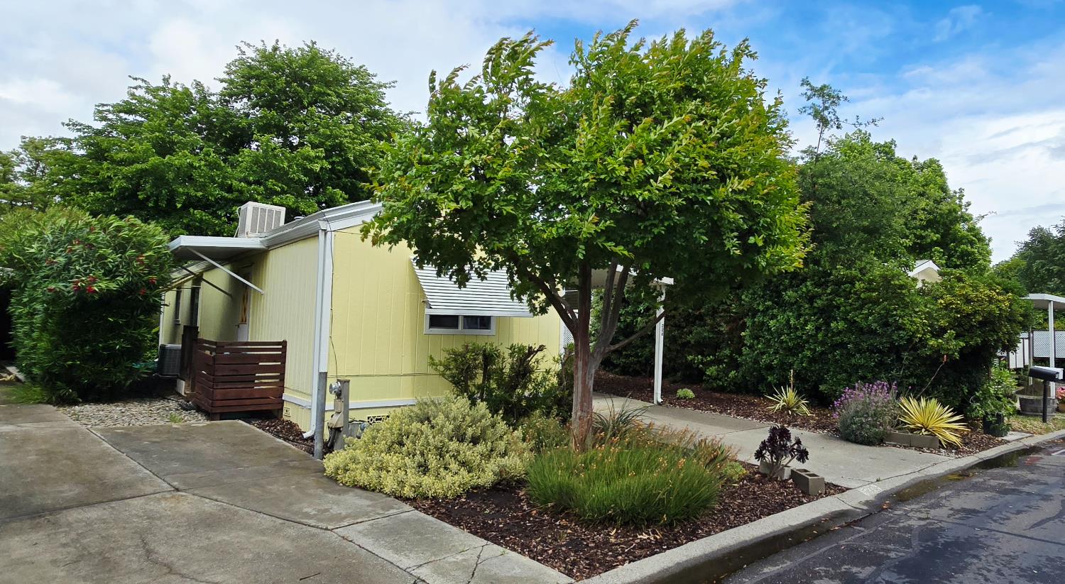 226 Full Circle Davis, CA 95618 - Photo 22 of 27 a view of a house with a yard and plants