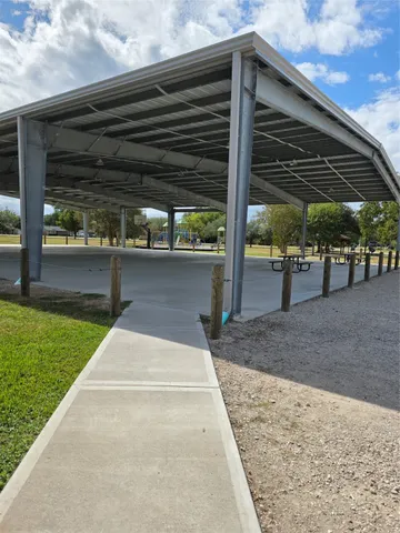 a view of backyard with cabin