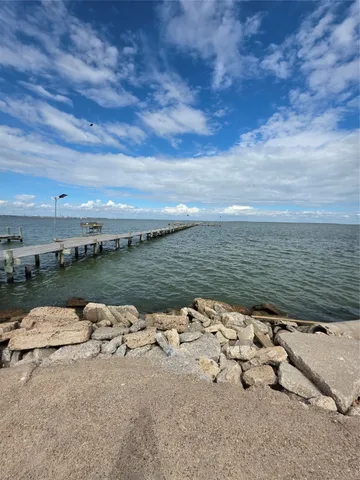 a view of a lake from a yard