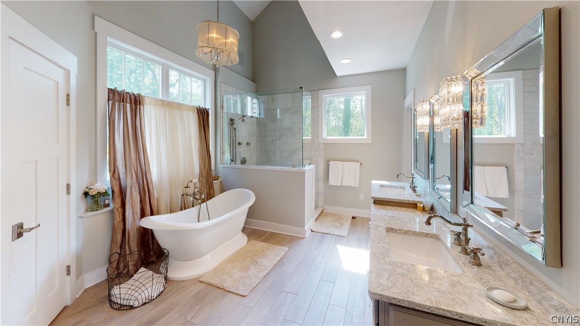 8861 Shellman Drive Cicero, NY 13039 - Photo 19 of 50 The high end master bathroom features ceramic tile
