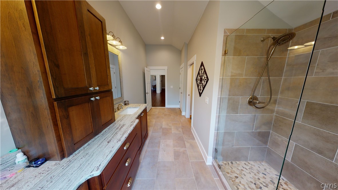 8861 Shellman Drive Cicero, NY 13039 - Photo 27 of 50 Bathroom 2 finishes include custom tile work on fl
