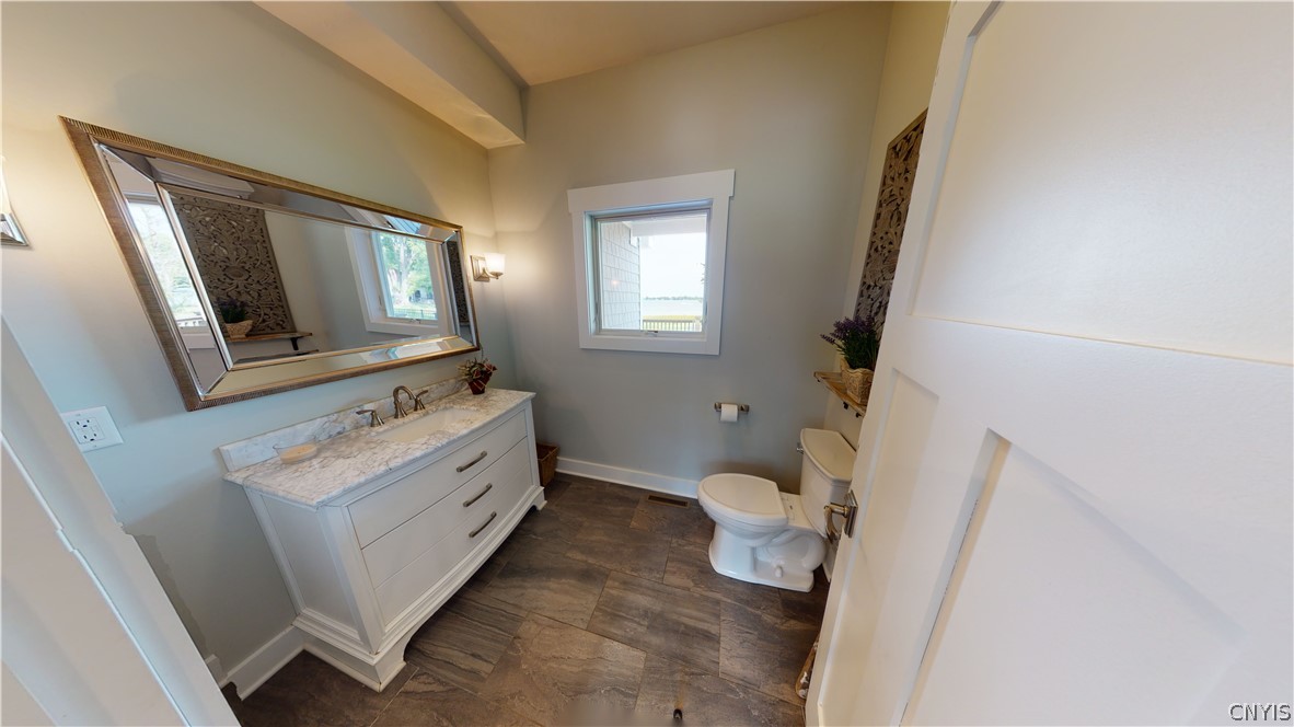 8861 Shellman Drive Cicero, NY 13039 - Photo 41 of 50 Half bathroom with high end fixtures including a m