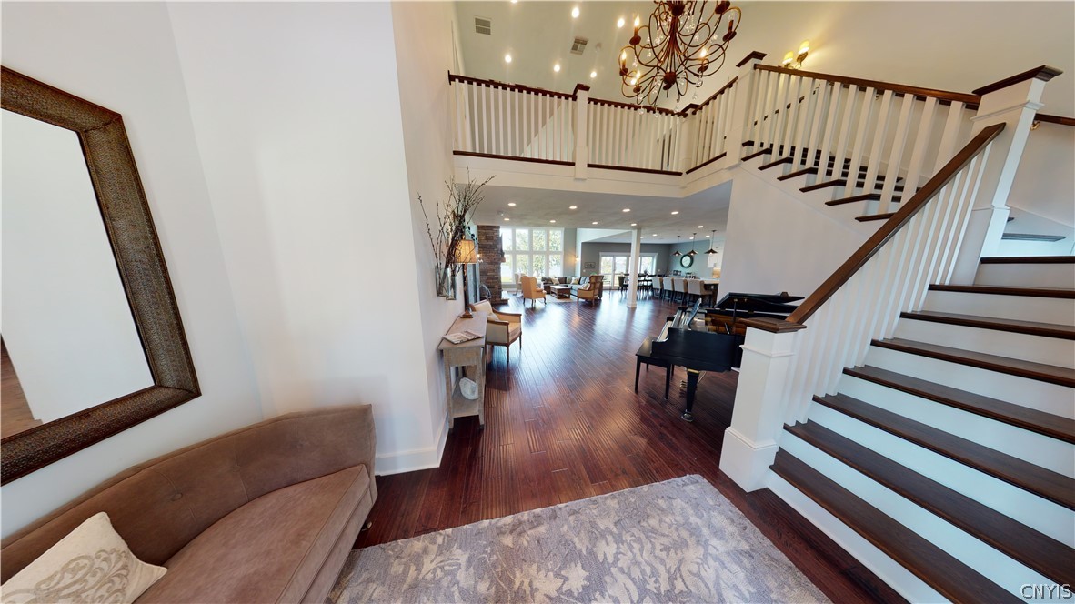 8861 Shellman Drive Cicero, NY 13039 - Photo 6 of 50 Arhause chandelier and wall sconces along with the