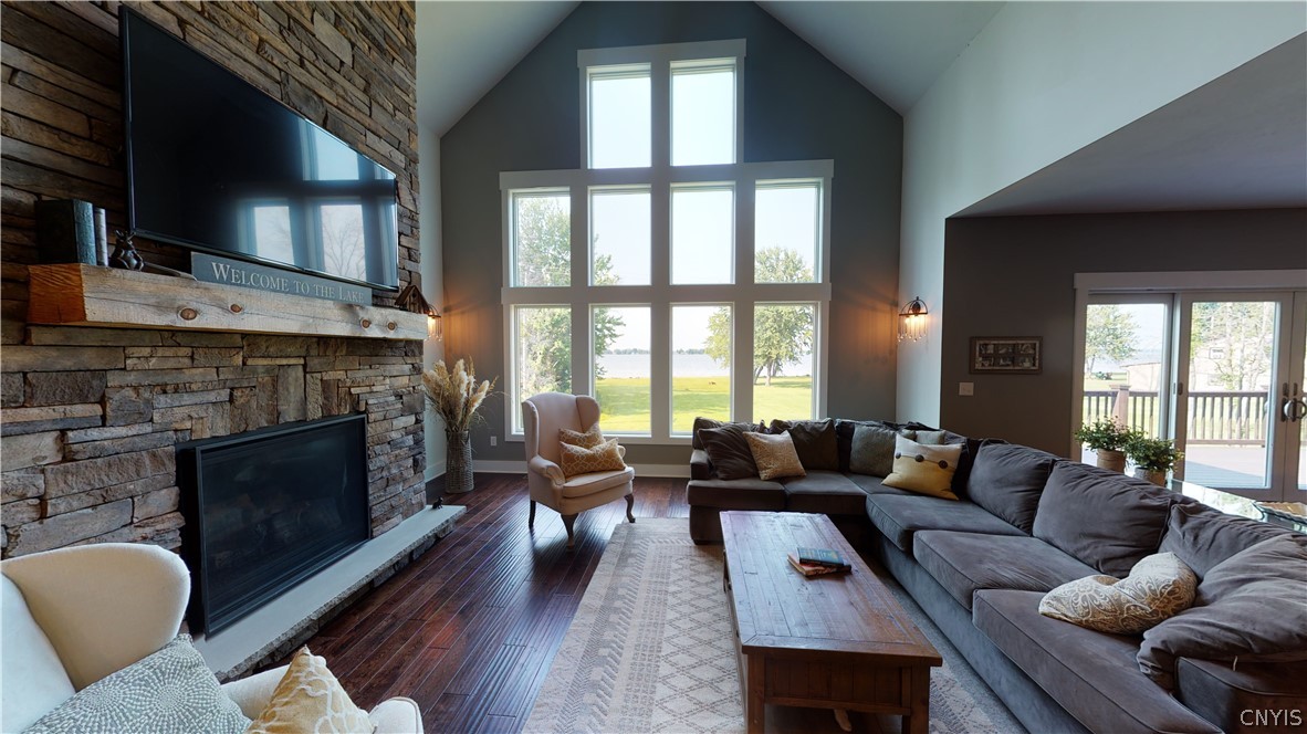 8861 Shellman Drive Cicero, NY 13039 - Photo 8 of 50 Floor to ceiling windows by the gas fireplace crea