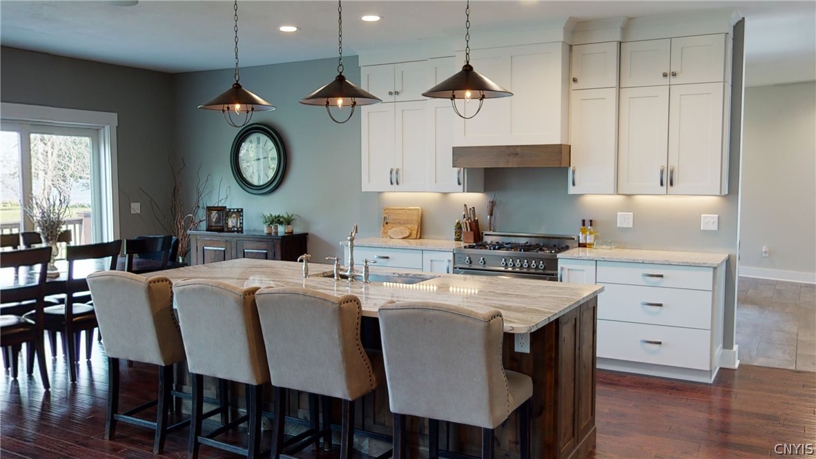 8861 Shellman Drive Cicero, NY 13039 - Photo 10 of 50 A chef's dream kitchen features custom cabinetry,