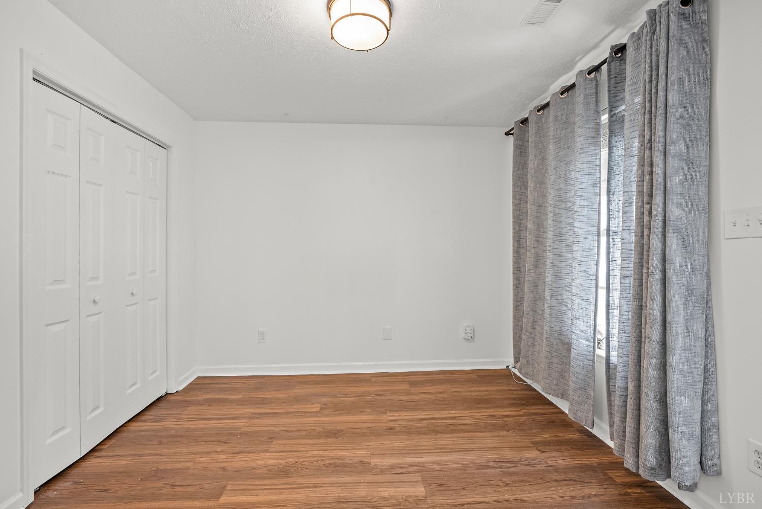 300 McConville Road, Unit 63 Lynchburg, VA 24502 - Photo 17 of 37 a view of a room with wooden floor