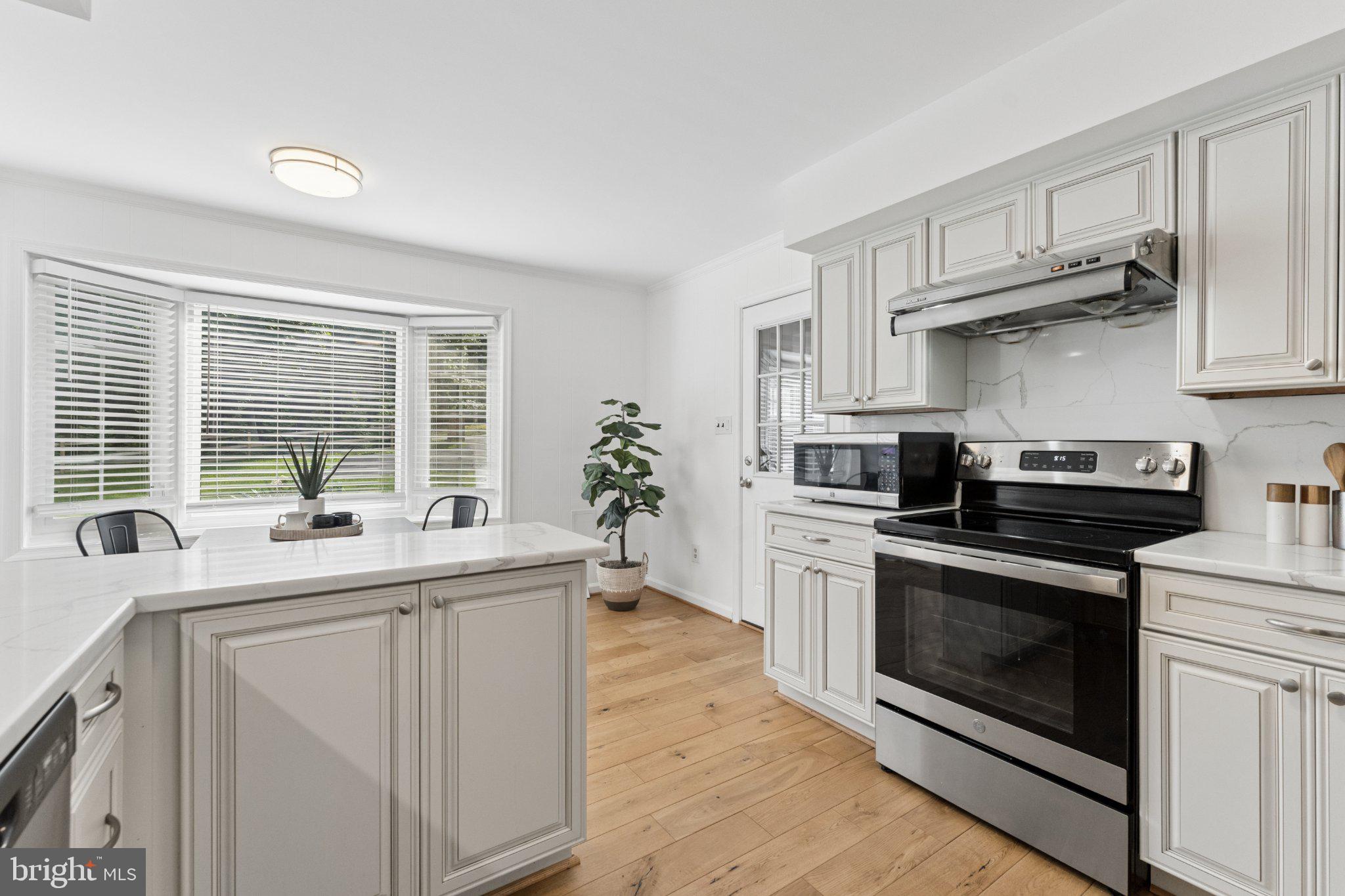 3219 Fox Mill Road Oakton, VA 22124 - Photo 26 of 87 Bright and airy modern kitchen space.