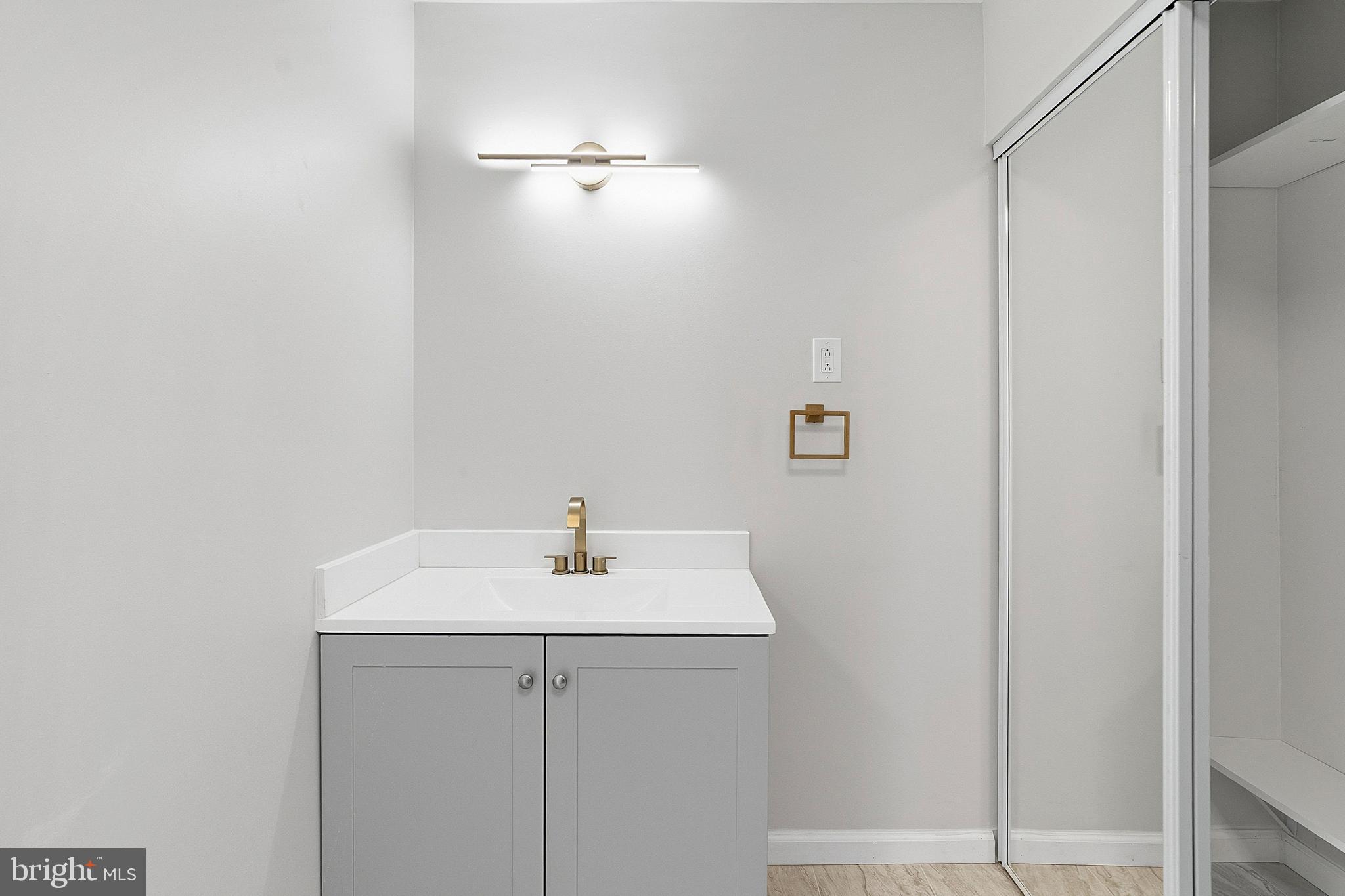 523 Front Street Palmyra, NJ 08065 - Photo 16 of 30 a bathroom with a sink and vanity
