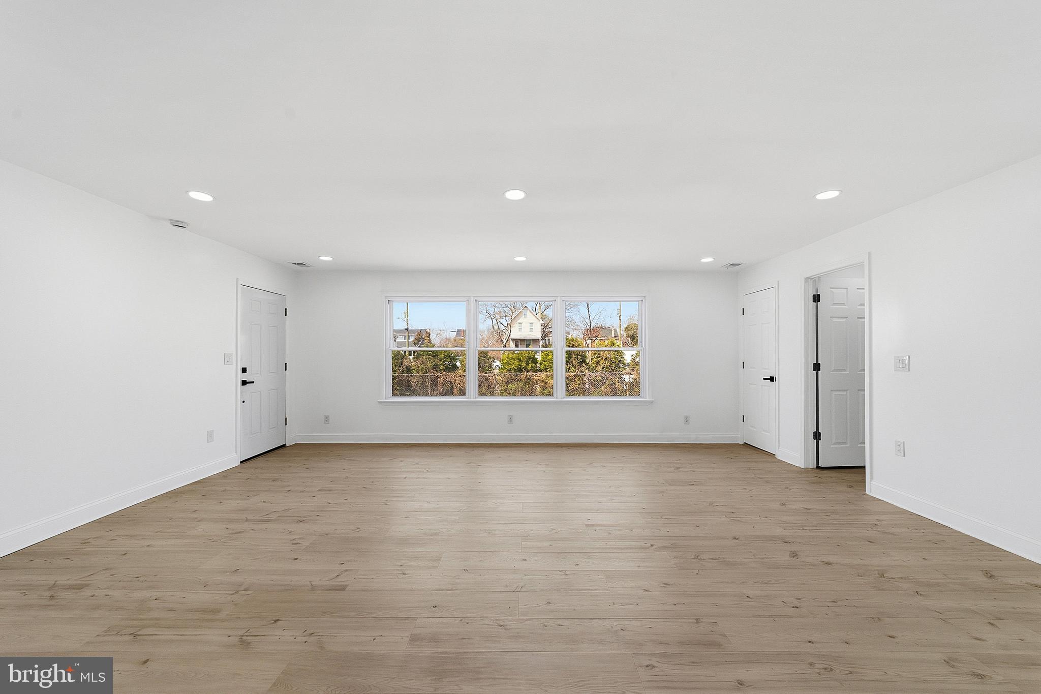523 Front Street Palmyra, NJ 08065 - Photo 25 of 30 wooden floor in an empty room with a window