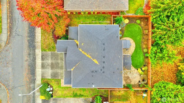 an aerial view of residential house with outdoor space