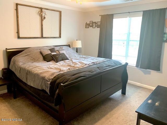 3315 Trotters Ridge Trail Gray, GA 31032 - Photo 14 of 33 a bedroom with a bed and window