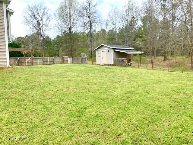 3315 Trotters Ridge Trail Gray, GA 31032 - Photo 28 of 33 a front view of a house with a yard