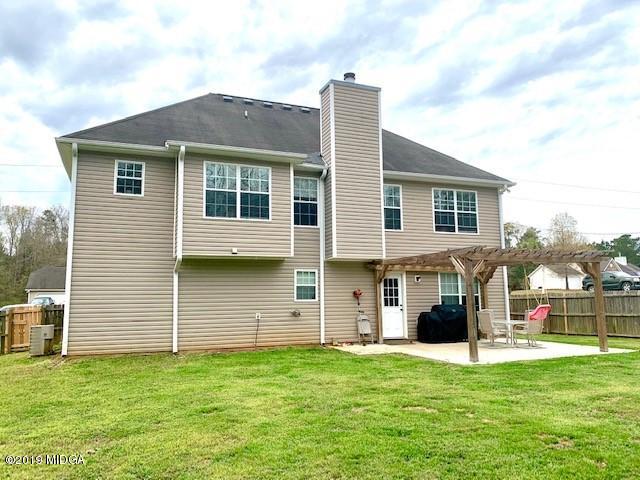 3315 Trotters Ridge Trail Gray, GA 31032 - Photo 30 of 33 a view of a house with a backyard