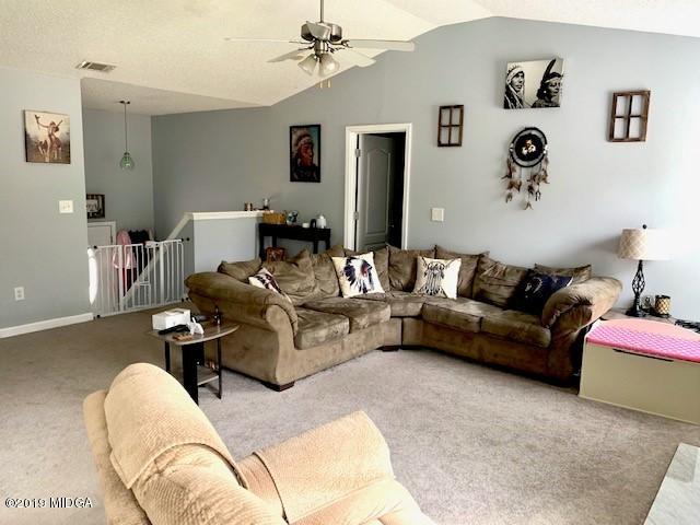 3315 Trotters Ridge Trail Gray, GA 31032 - Photo 7 of 33 a living room with furniture and a couch