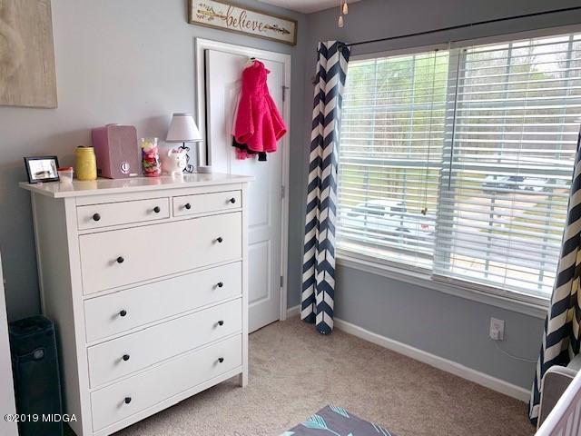 3315 Trotters Ridge Trail Gray, GA 31032 - Photo 10 of 33 a room with a window and a dresser