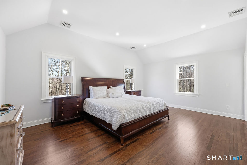 21 Split Rock Road Newtown, CT 06470 - Photo 15 of 40 a bedroom with a bed and a window