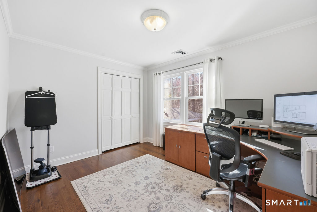 21 Split Rock Road Newtown, CT 06470 - Photo 24 of 40 a view of a workspace with furniture and a window