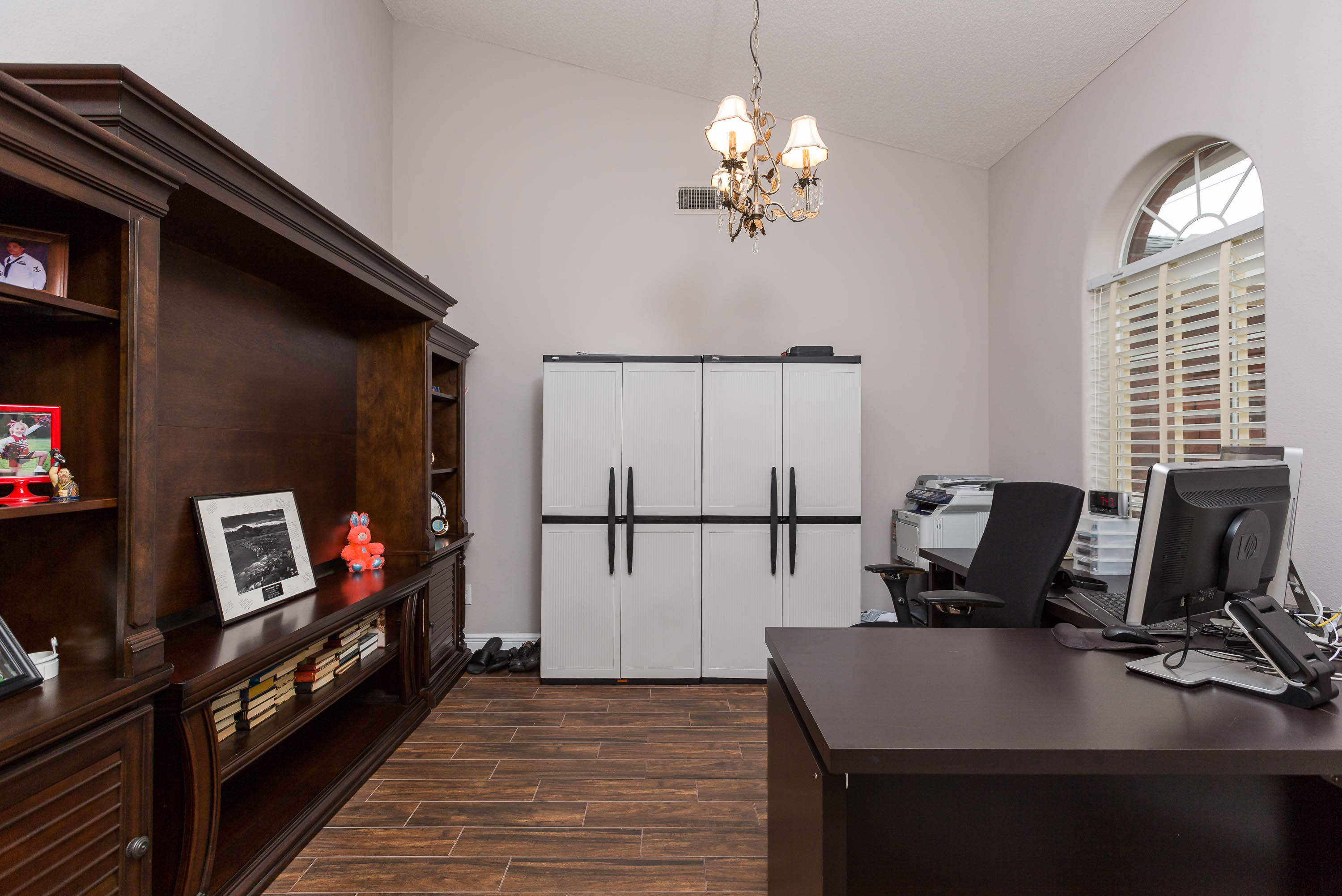 402 Swift Fox Run Crestview, FL 32536 - Photo 20 of 47 a view of a workspace with furniture and a flat screen tv