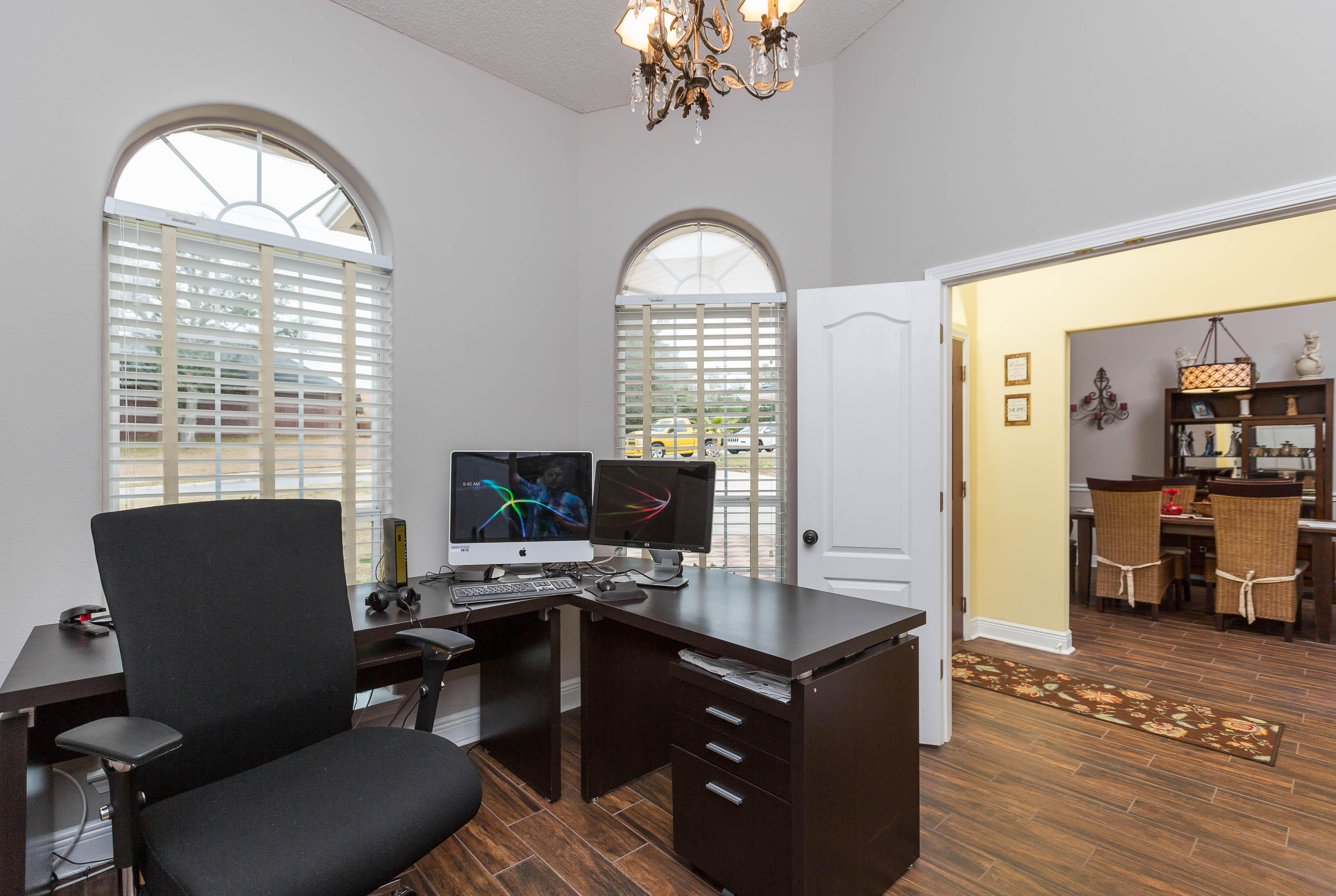 402 Swift Fox Run Crestview, FL 32536 - Photo 21 of 47 a workspace with wooden floor and a window