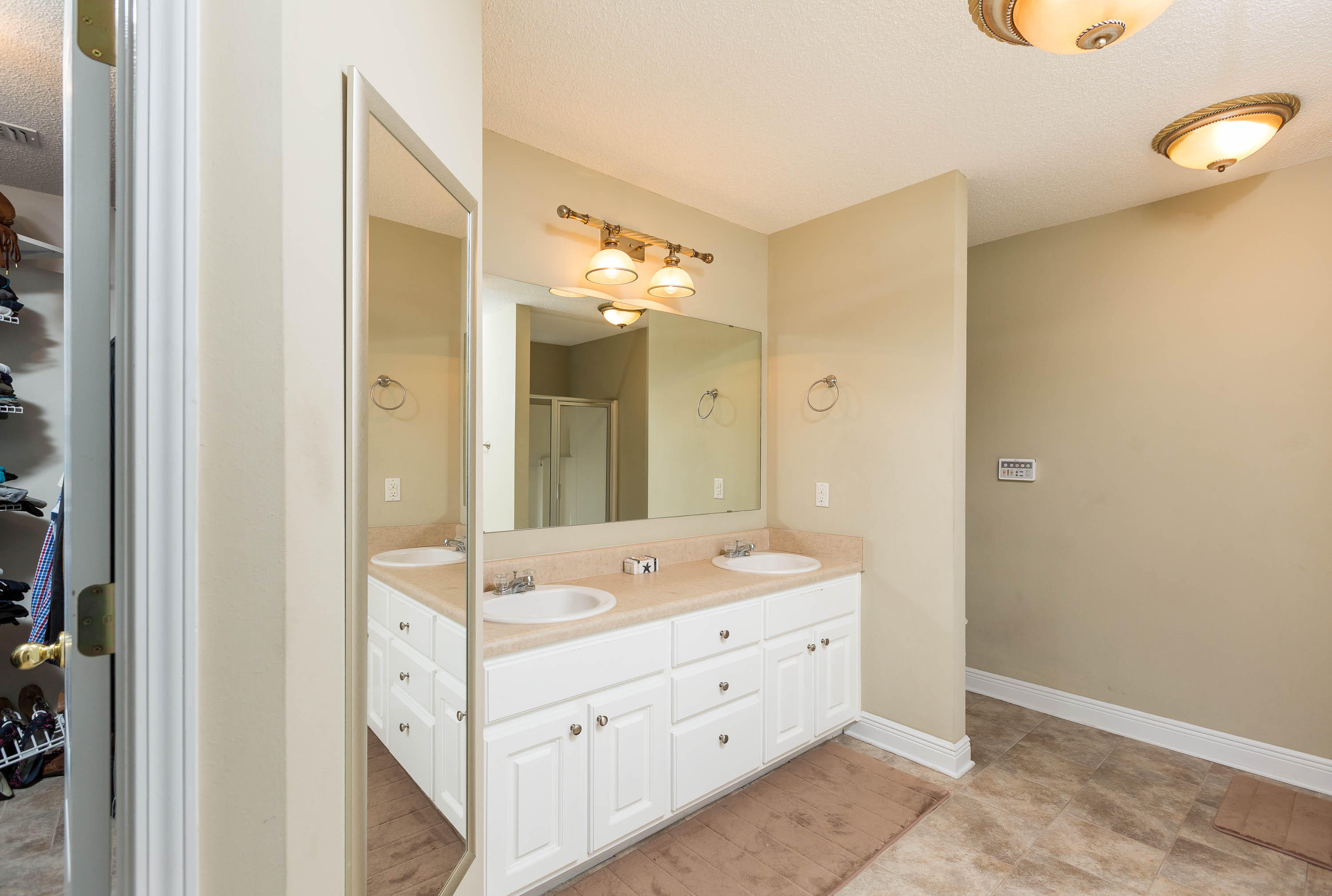 402 Swift Fox Run Crestview, FL 32536 - Photo 35 of 47 a bathroom with a double vanity sink mirror and double