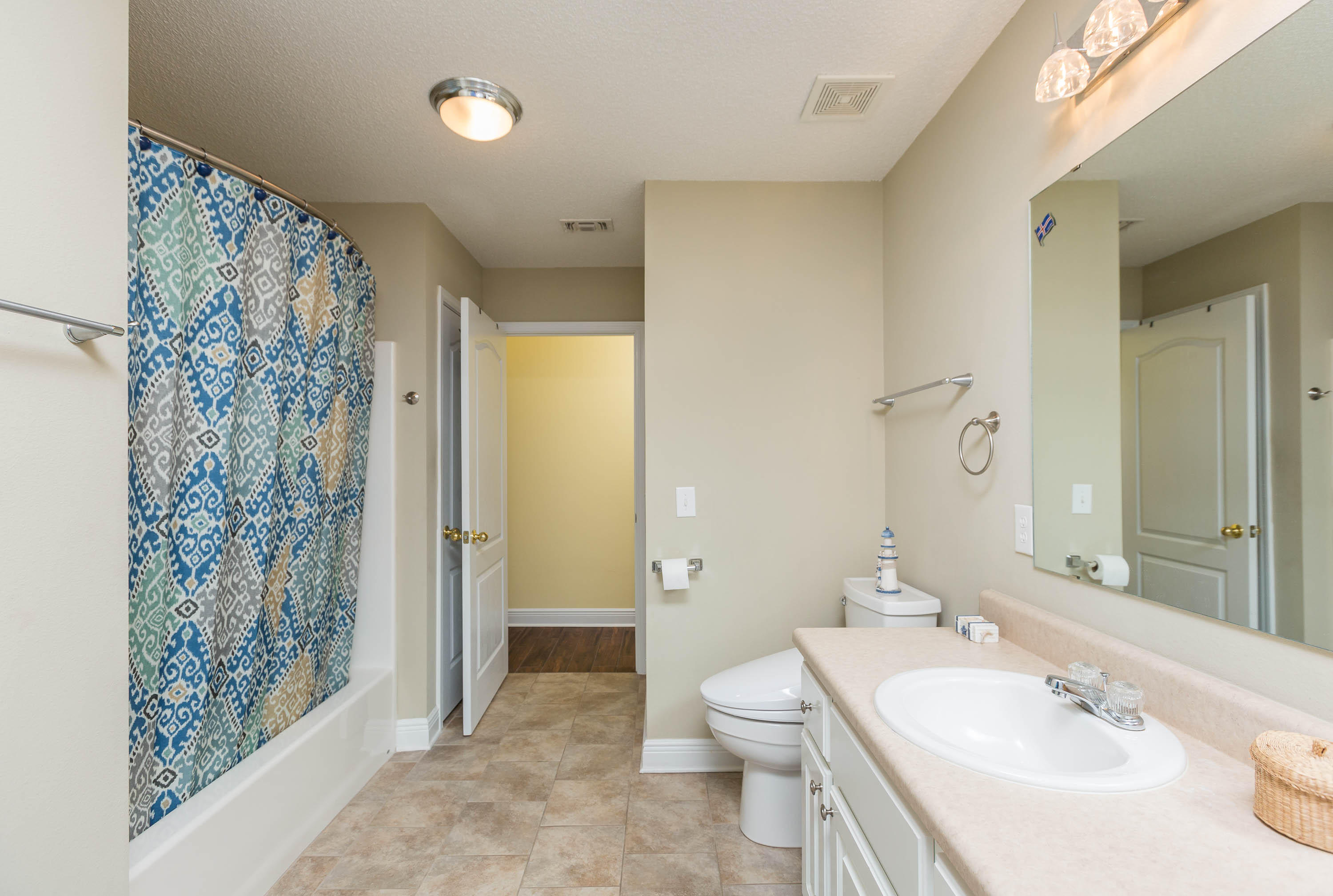 402 Swift Fox Run Crestview, FL 32536 - Photo 40 of 47 a bathroom with a sink toilet and shower