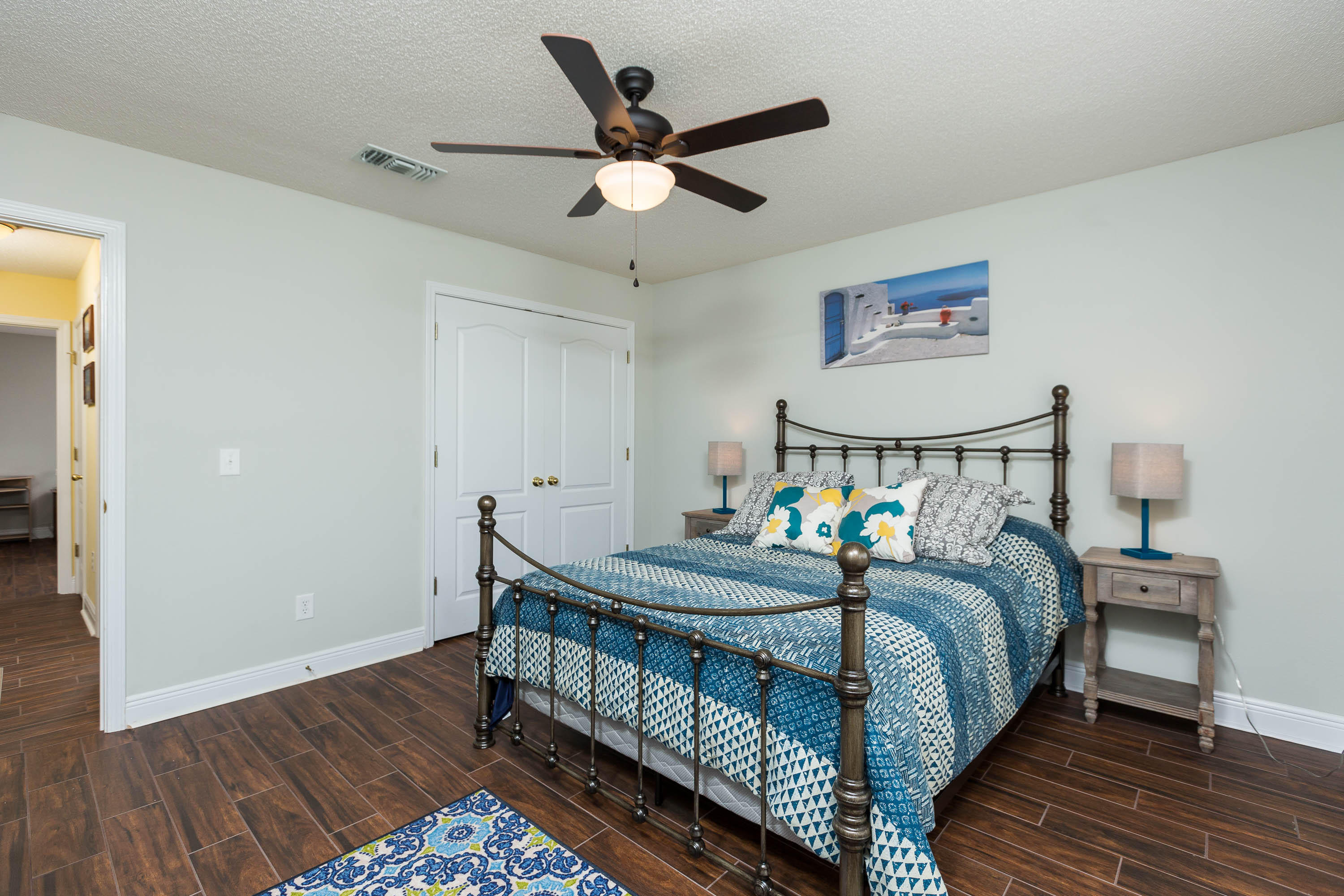 402 Swift Fox Run Crestview, FL 32536 - Photo 43 of 47 a bedroom with bed and a table