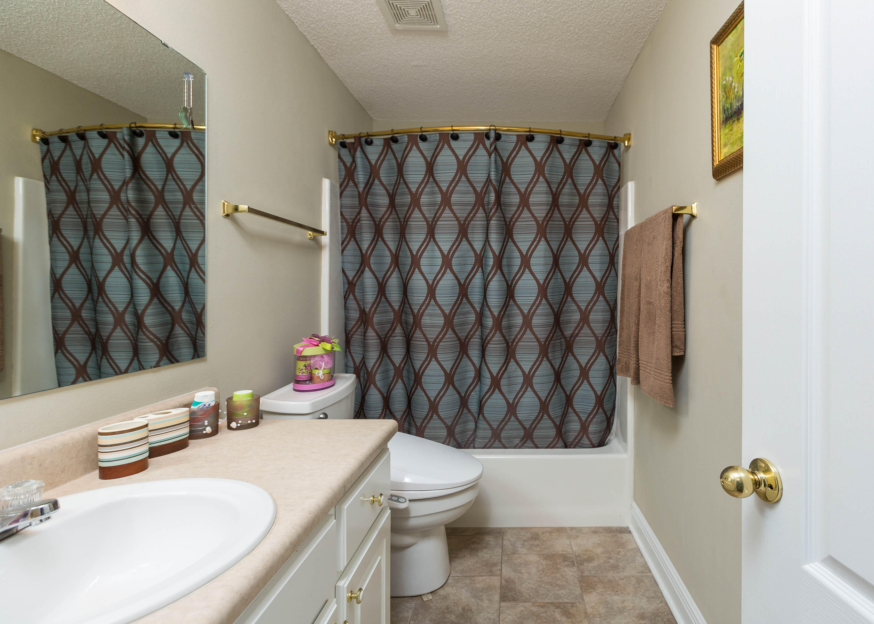 402 Swift Fox Run Crestview, FL 32536 - Photo 44 of 47 a bathroom with a sink toilet and shower