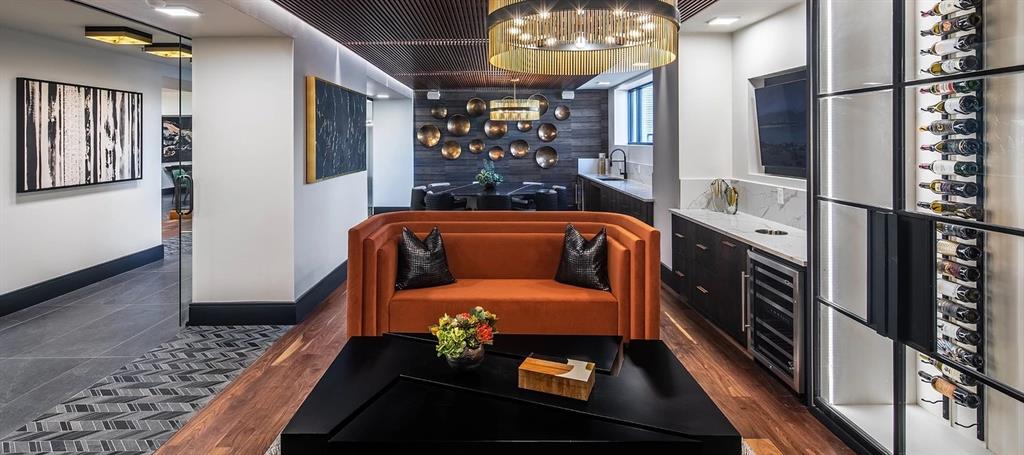 880 Lake Carolyn Parkway, Unit 319 Irving, TX 75039 - Photo 12 of 18 a room with furniture and chandelier