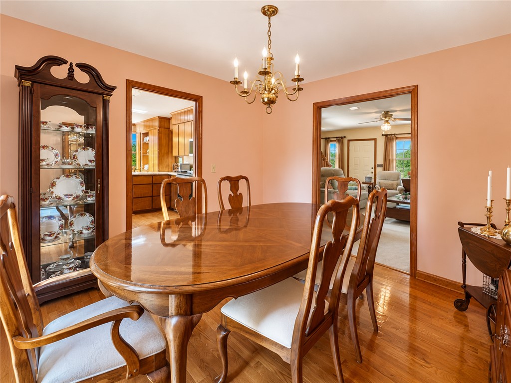 222 Terrace Drive Anderson, SC 29621 - Photo 13 of 37 Elegant hardwood flooring defines this inviting dining space, ready for memorable meals.