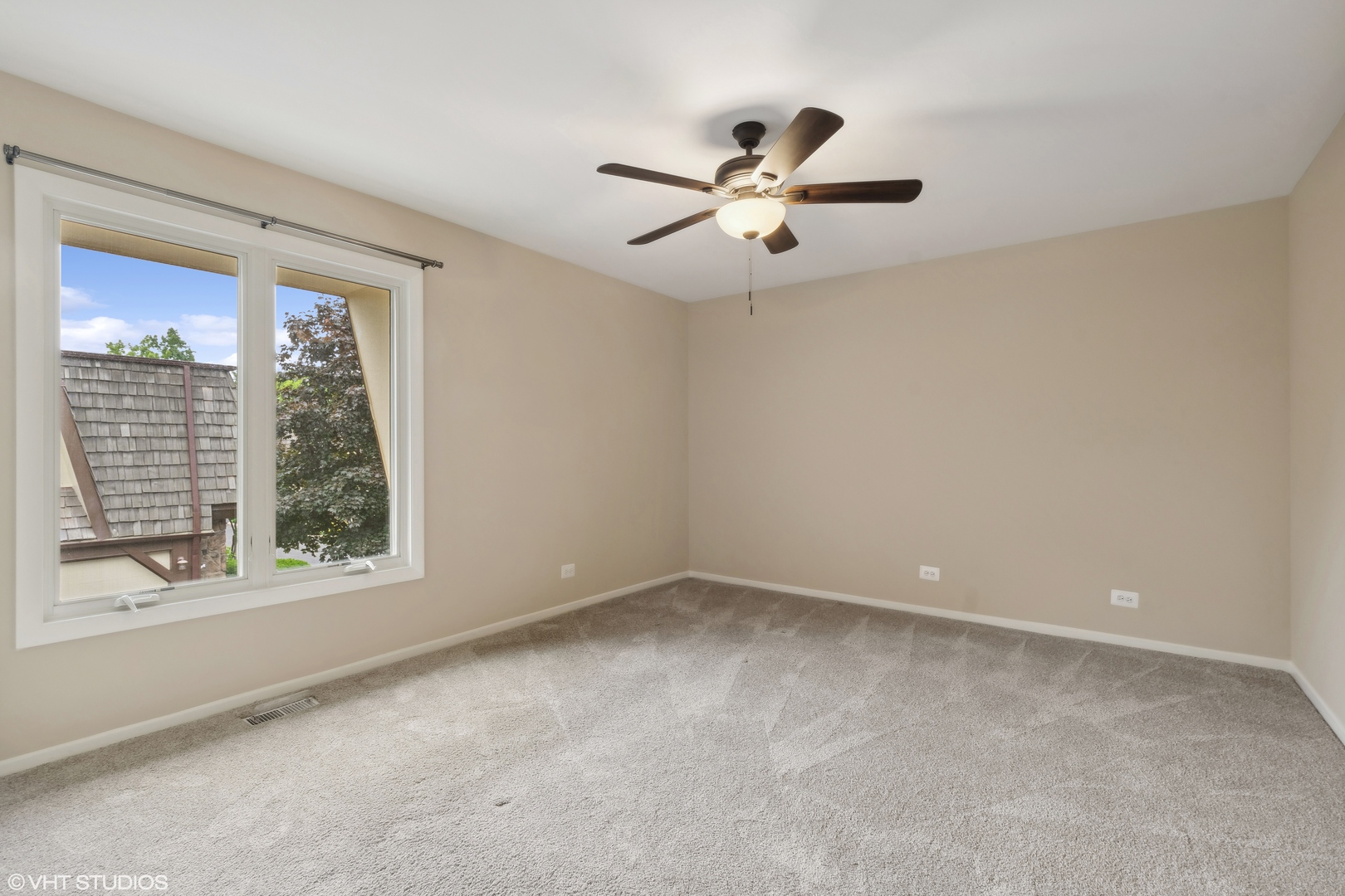 1649 Winnetka Road, Unit 1649 Glenview, IL 60025 - Photo 11 of 17 a view of an empty room with a window