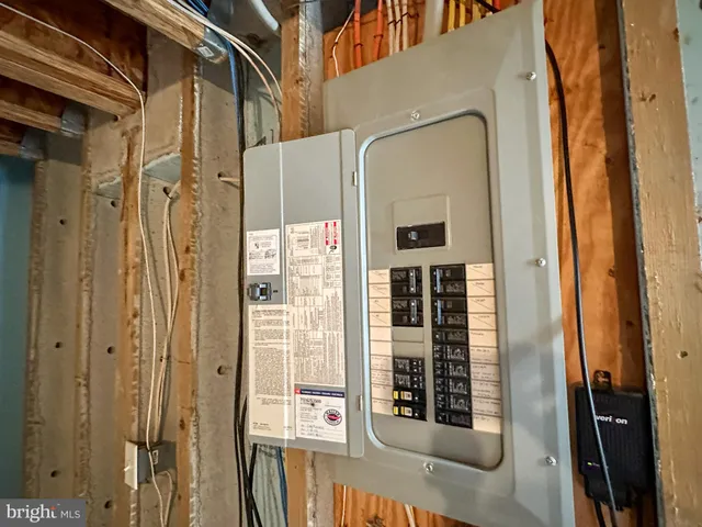 a view of front door and potted plants