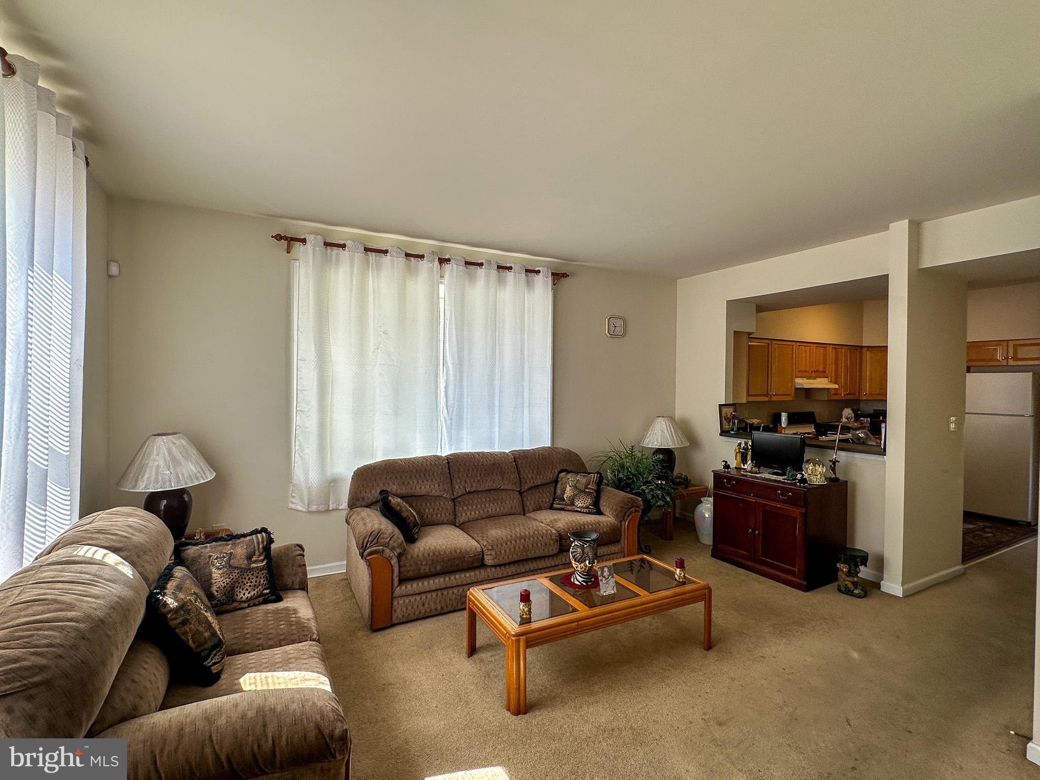 901 Merchant Street Coatesville, PA 19320 - Photo 6 of 36 a living room with furniture and a window