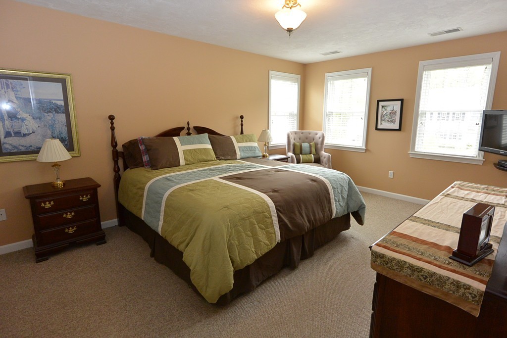 4 Harding Lane Sturbridge, MA 01518 - Photo 11 of 23 a bedroom with bed and window