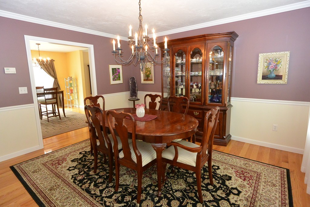 4 Harding Lane Sturbridge, MA 01518 - Photo 6 of 23 a view of a dining room with furniture and chandelier
