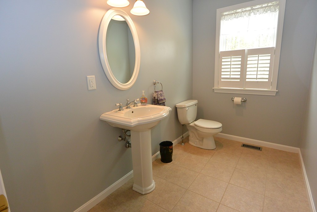 4 Harding Lane Sturbridge, MA 01518 - Photo 8 of 23 a bathroom with a toilet sink and mirror