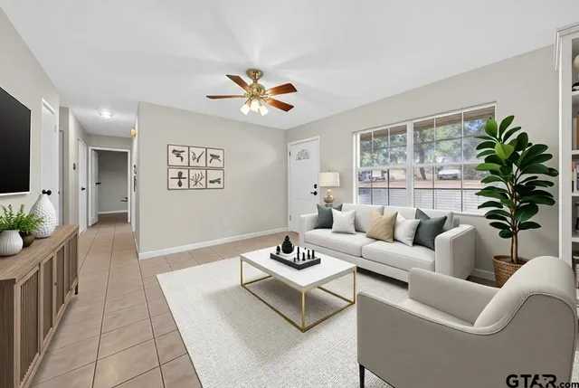 a kitchen with cabinets and refrigerator
