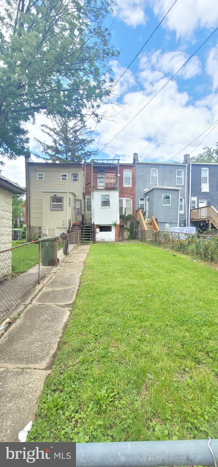 4041 Fairfax Road Baltimore, MD 21216 - Photo 2 of 10 a house view with a sitting space and garden