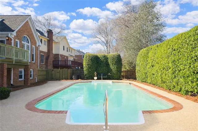 a view of a playground with basketball court