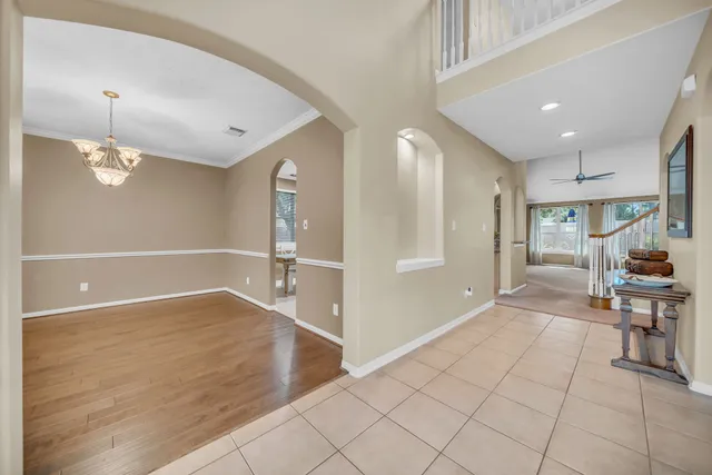 a view of a livingroom with furniture and windows