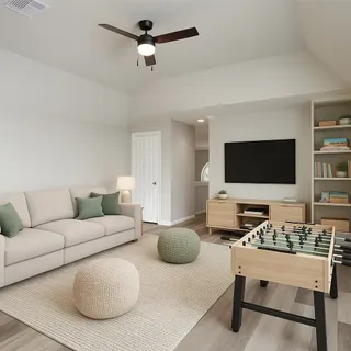 a living room with furniture and a flat screen tv