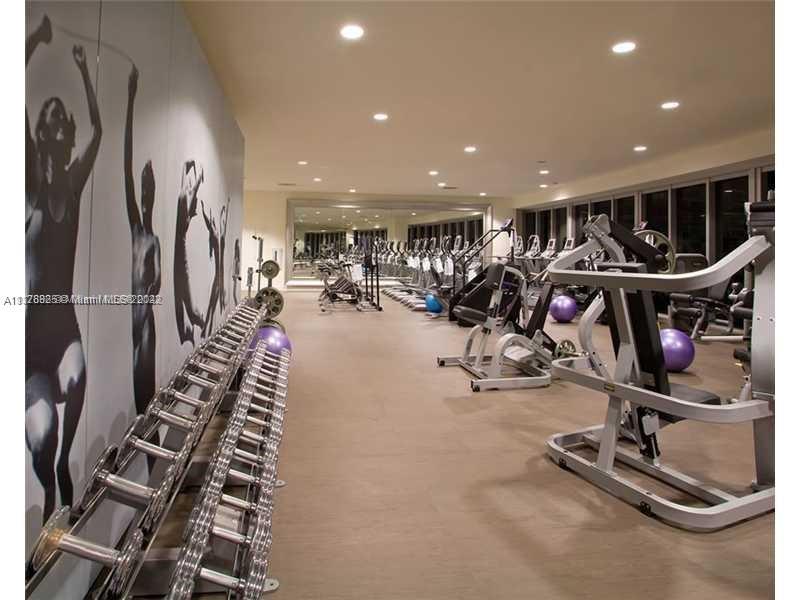 475 Brickell Avenue, Unit 808 Miami, FL 33131 - Photo 12 of 12 a view of a room with gym equipment
